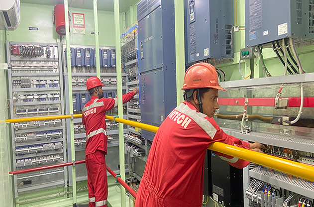 What are the safety precautions during port crane operation